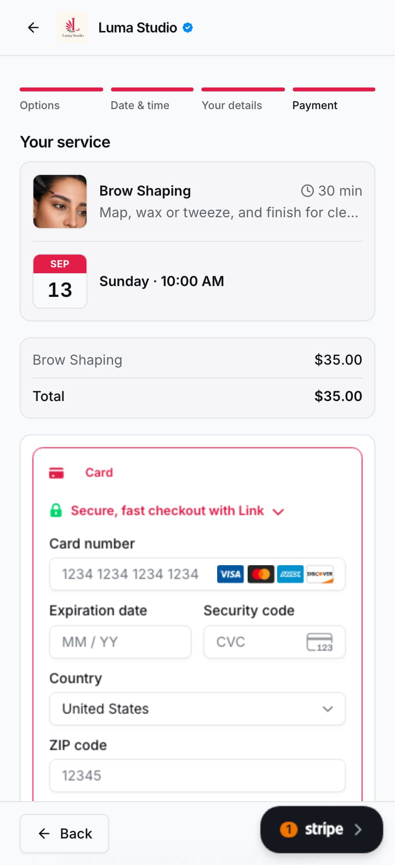 The booking checkout on a phone: Brow Shaping total, a 10% new-client sale, and the Stripe card form